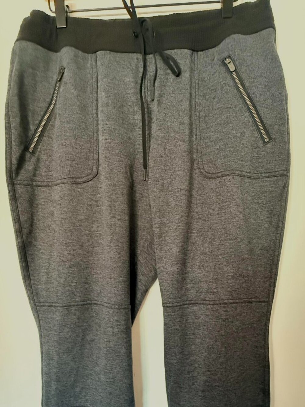 Women's Athleta Flux Street Jogger in a heathered charcoal gray (black) S Large